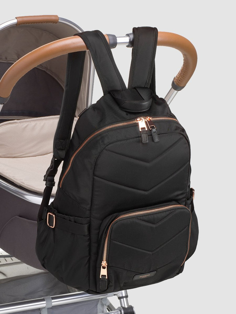 storksak hero quilt black, changing bag backpack, attached to pram with built-in stroller clips