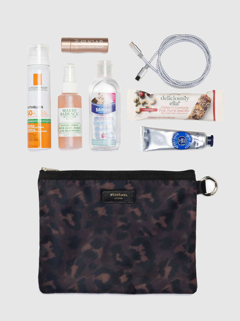 Parent pouch set black & leopard | flat lay leopard pouch with items for mum