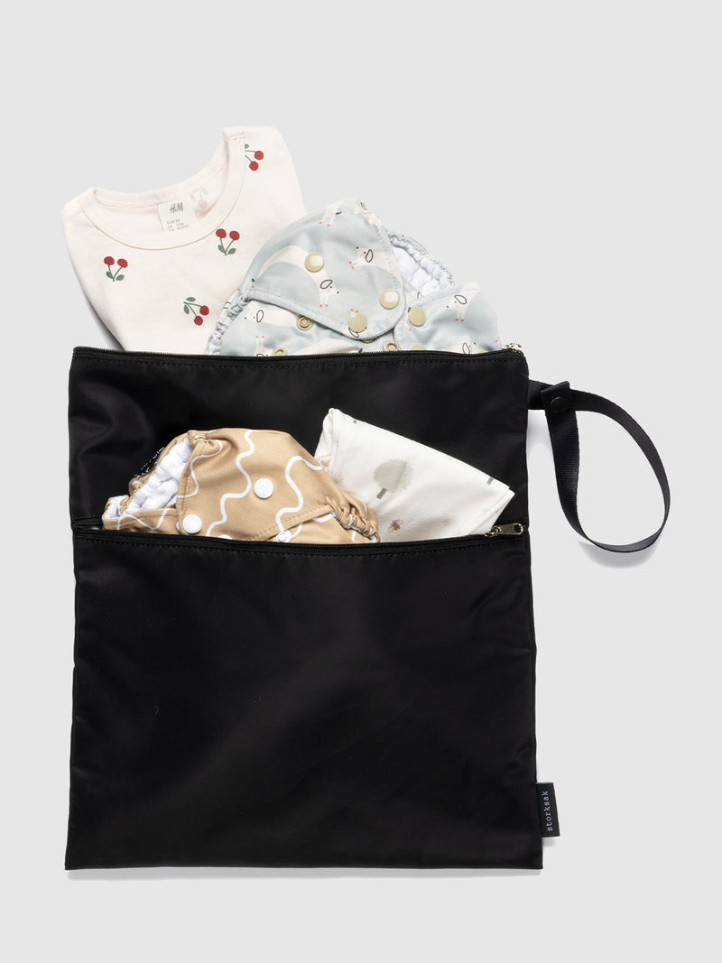 Storksak Wet Bag & change pouch set black | wet bag filled with reusable nappies