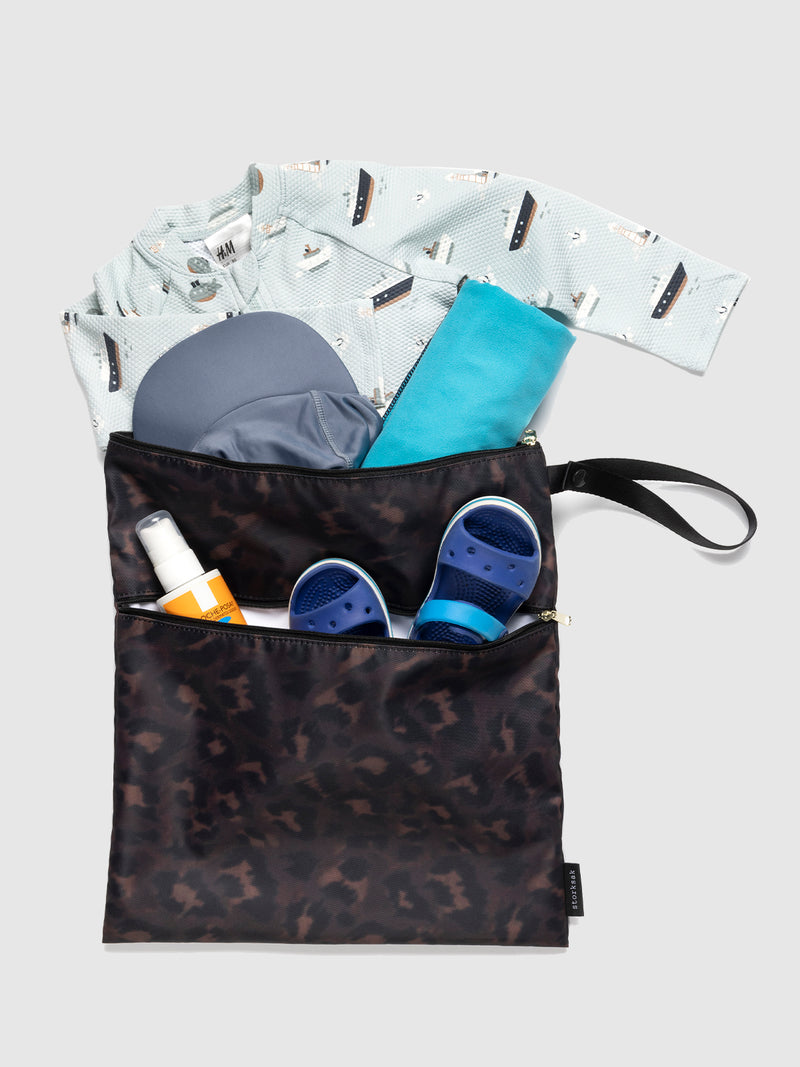 Storksak Wet Bag & change pouch set leopard | wet bag filled with items for beach/ swim