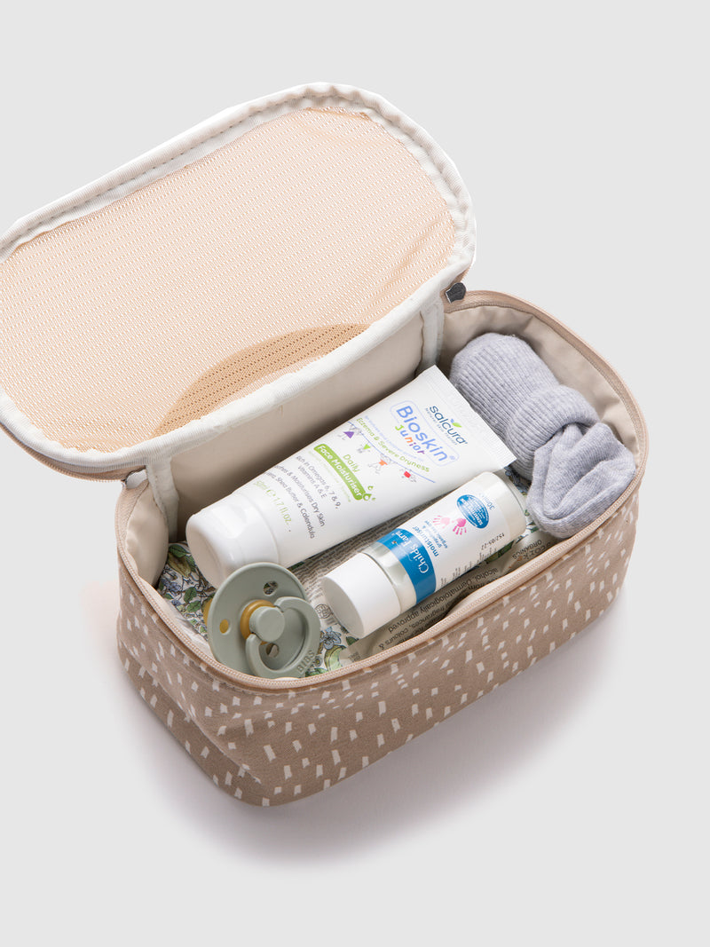 Storksak organic nappy caddy seashell | zipped pouch with baby creams inside 