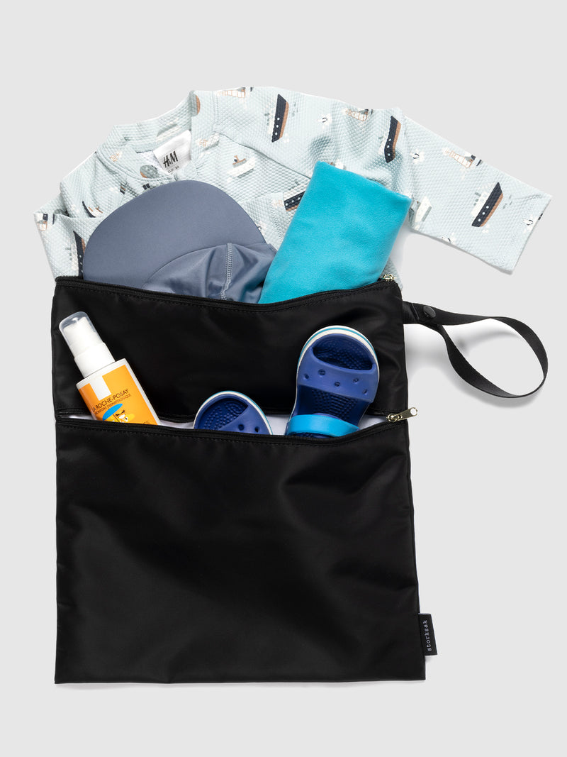 Storksak Wet Bag & change pouch set black | wet bag filled with items for beach/ swim