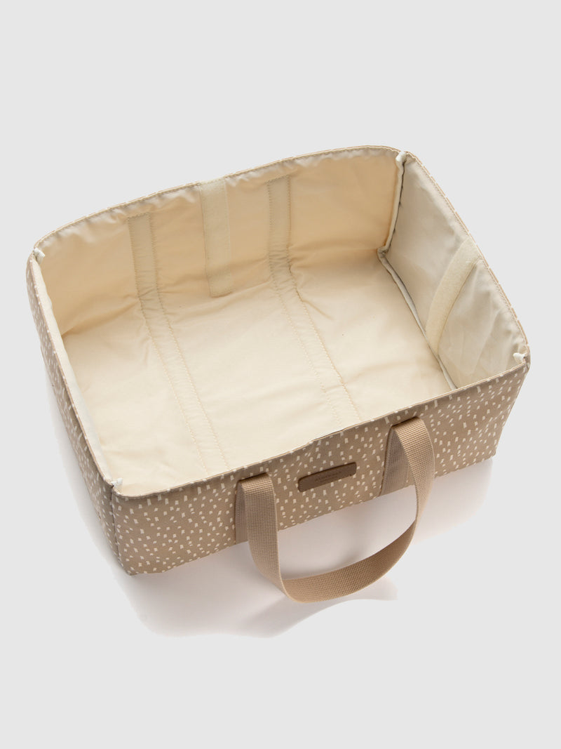 Storksak organic nappy caddy seashell |Top view with dividers removed from caddy