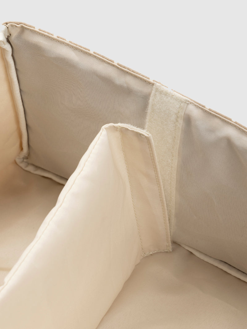 Storksak organic nappy caddy seashell | close up showing how dividers are removed