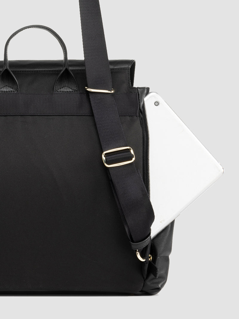 Storksak st james leather quilt black | back view with iPad in zipped pocket