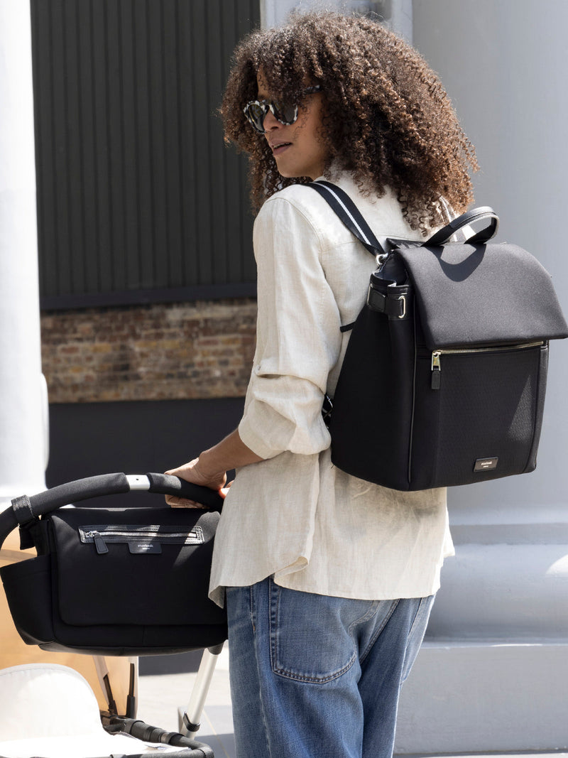 St James Scuba Black & Silver | mum wearing bag as backpack with matching stroller bag