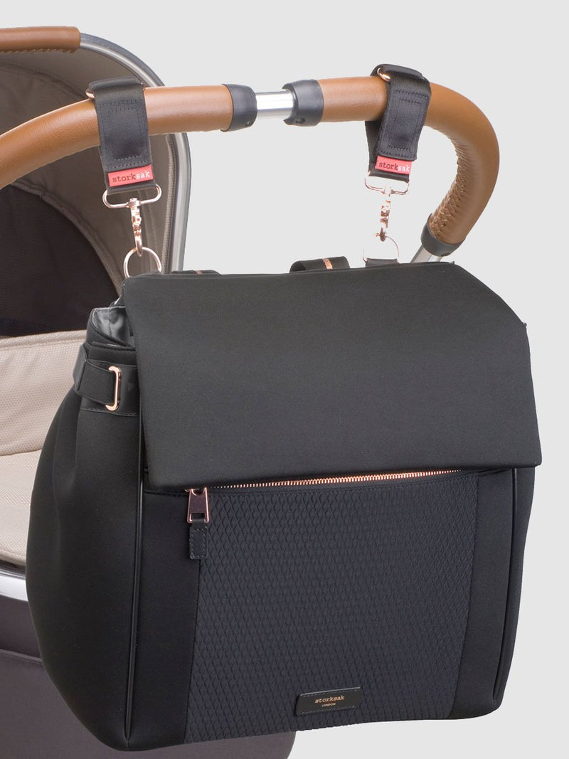 storksak st james scuba black, convertible changing bag, attached to pram with stroller clips