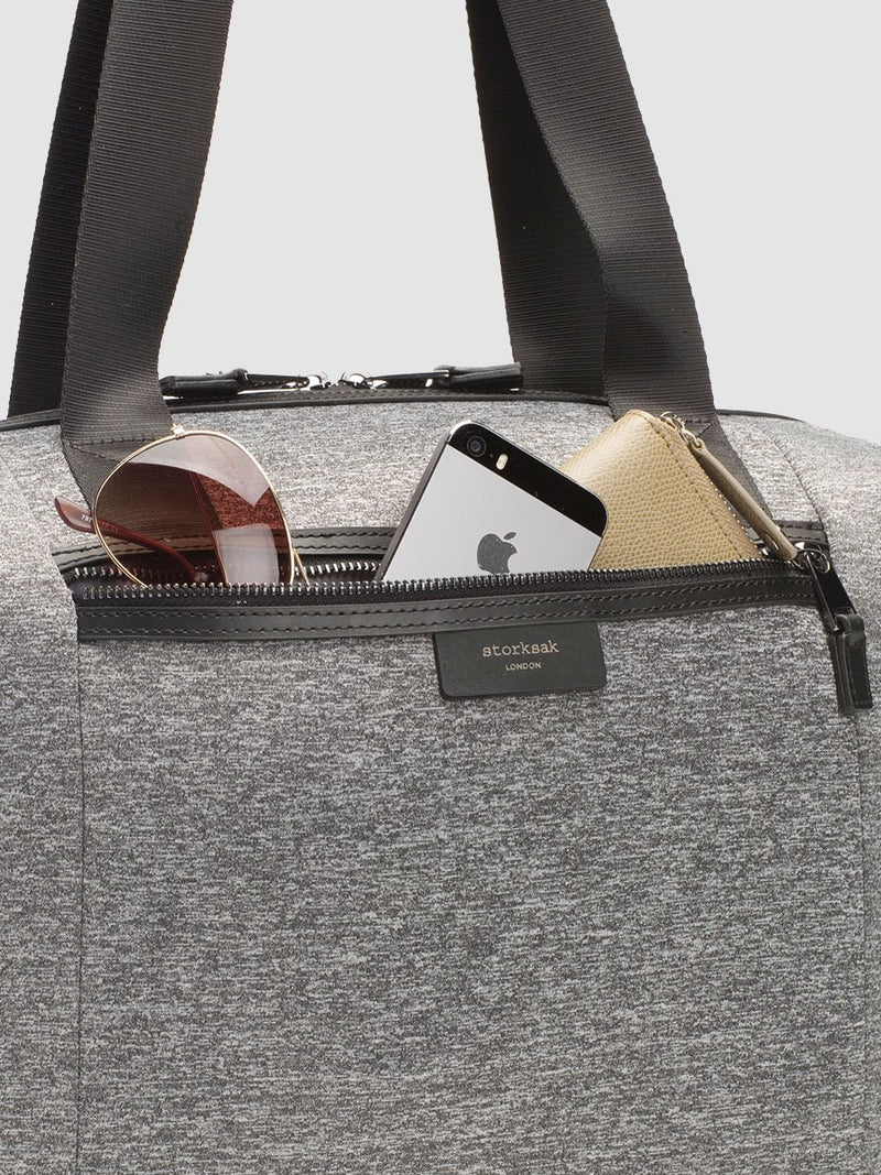 storksak stevie luxe scuba grey marl, changing bag, close up of front pocket with gunmetal trim