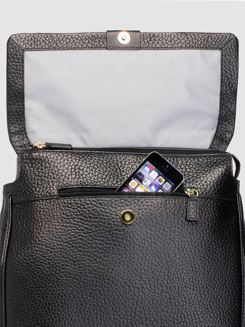 storksak st james leather black, luxury convertible changing bag, flap open with hidden phone pocket showing