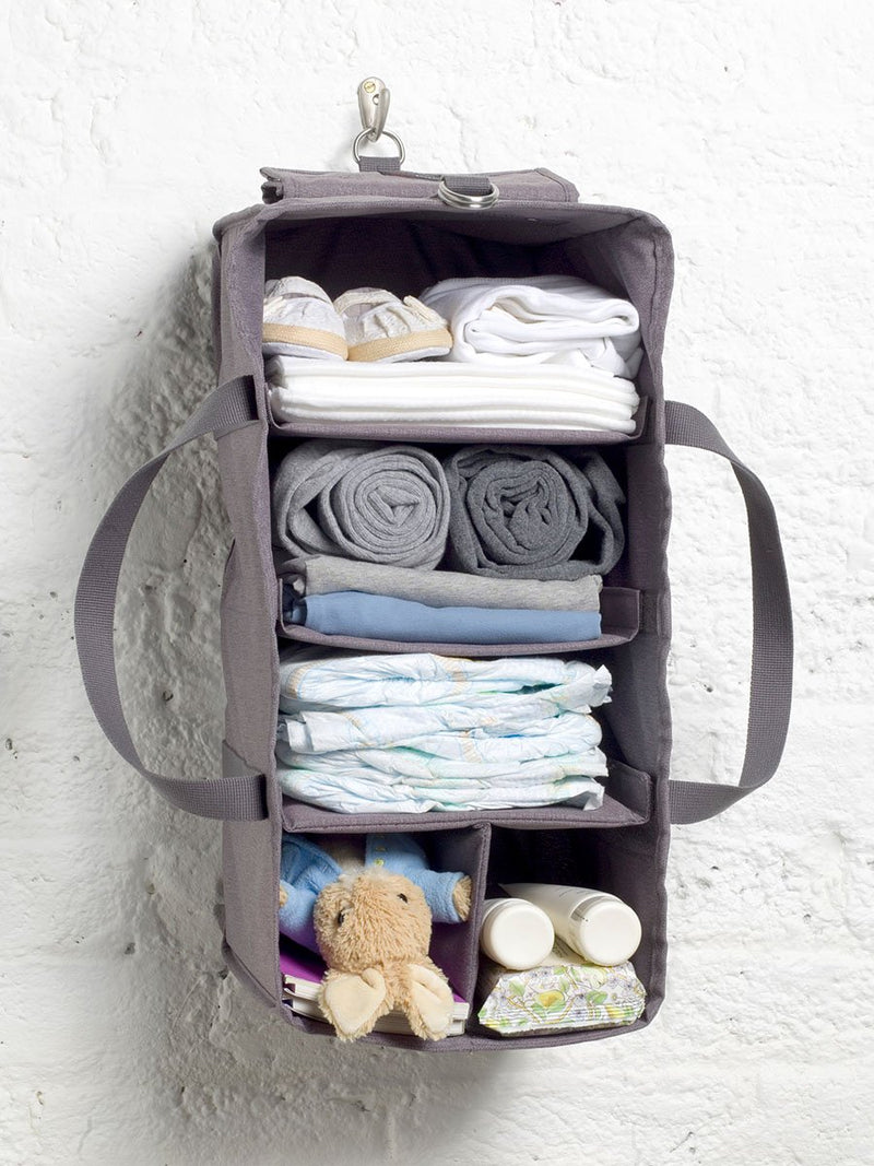 storksak travel cabin carry-on grey, hospital bag, hanging organiser packed with baby items and hung on a hook