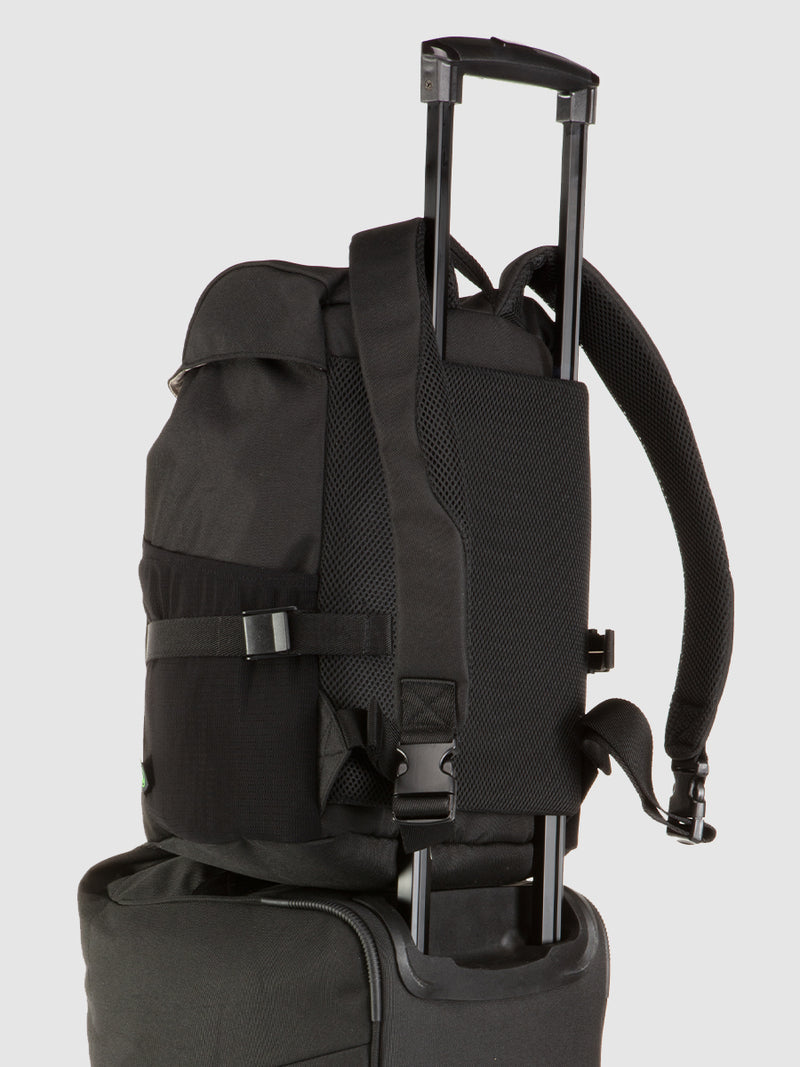 storksak travel eco backpack black, changing bag rucksack, recycled material, shown attached to eco cabin carry-on