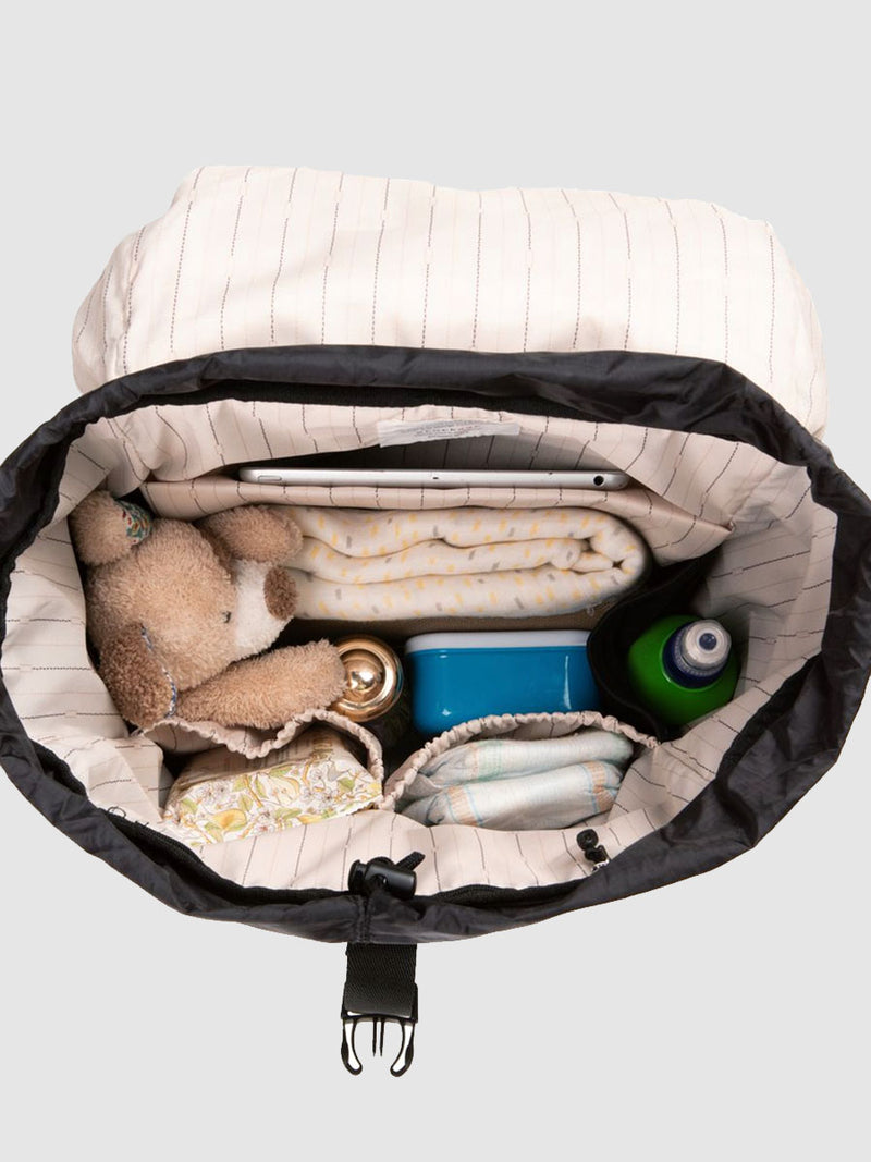 Storksak Travel Eco Backpack Toffee | internal view with baby items inside