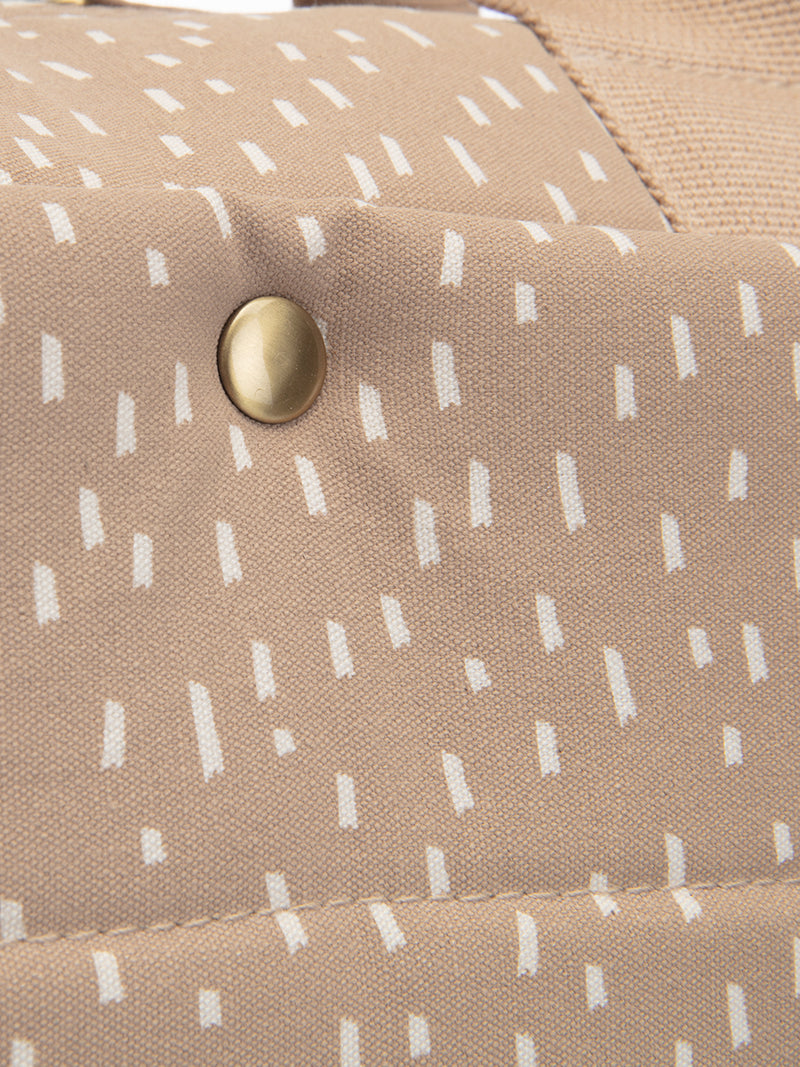 storksak organic cotton changing bag, close up view of cotton matterial