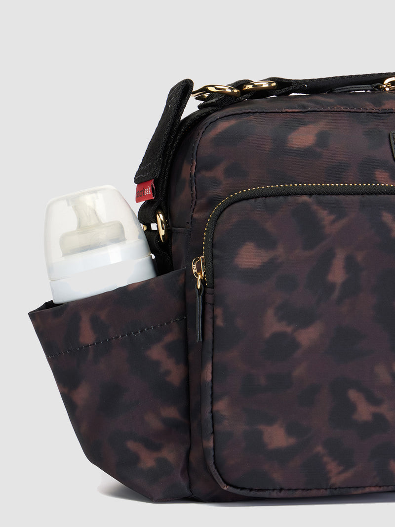 storksak stroller bag leopard | side bottle pocket